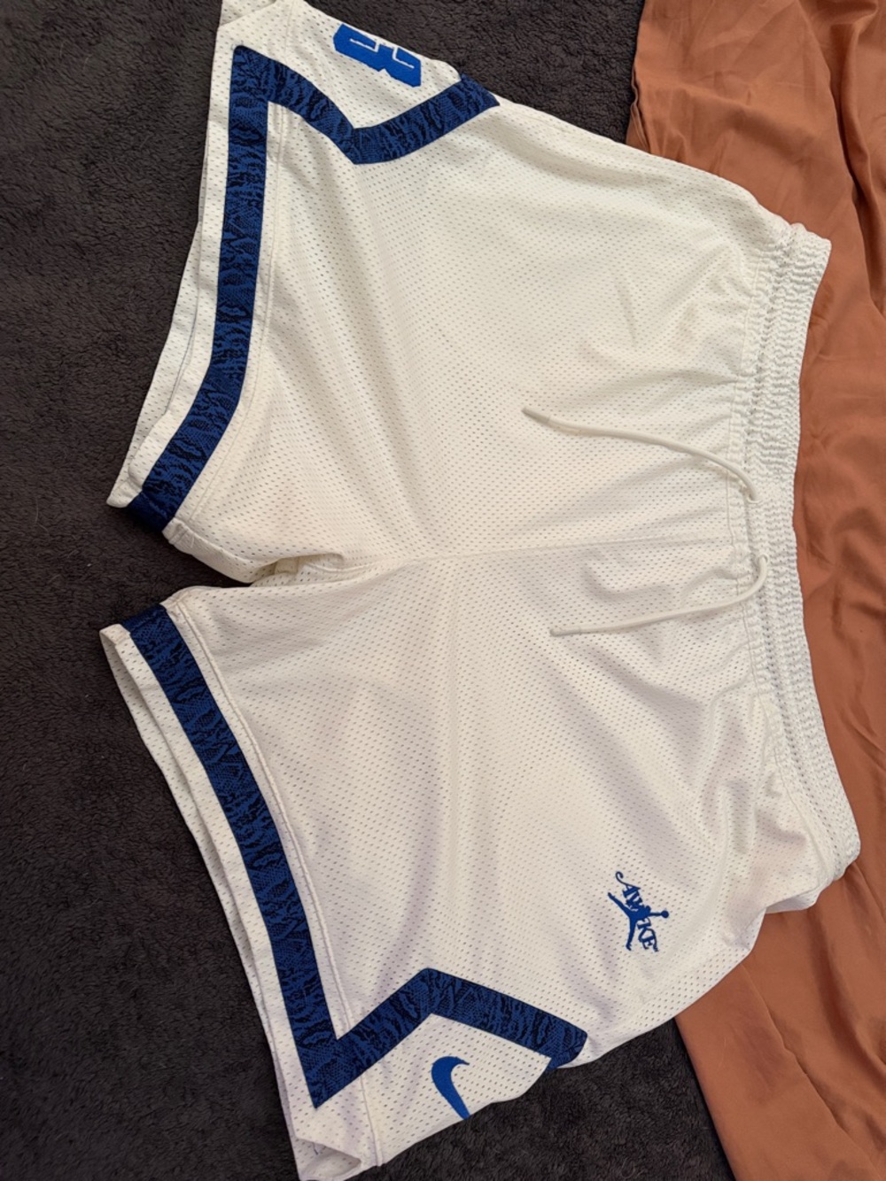 Jordan White Athletic Shorts with Blue Trim
